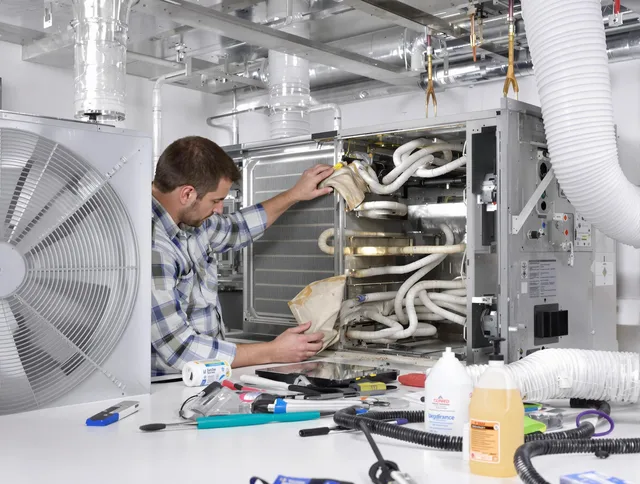 Somerset Air Duct Cleaning specialist performing precision AC coil cleaning in Somerset