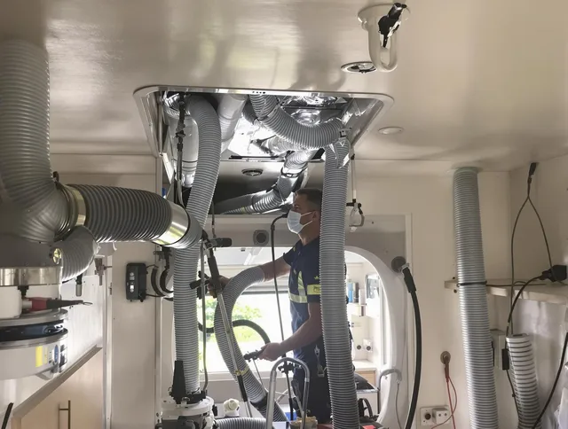 Somerset Air Duct Cleaning specialist performing precise mobile home duct cleaning in Somerset